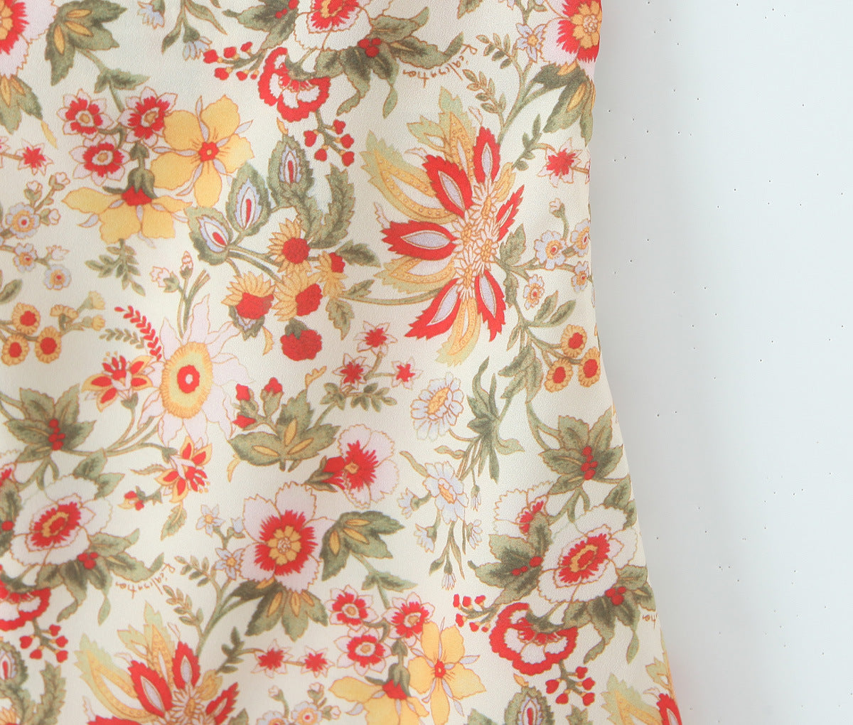 Robe courte trapèze fleurie à bretelles
