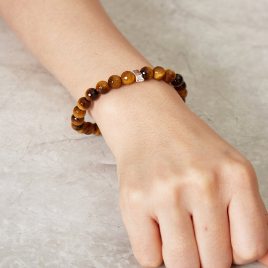 Faceted Tiger's Eye Gemstone Stretch Bracelet with Charm Created with Zircondia® Crystals