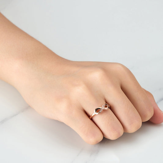 Rose Gold Plated Infinity Ring Created with Zircondia® Crystals