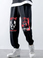 Pantalon de jogging ROMWE Grunge Punk pour homme avec imprimé tête de mort et texte à cordon