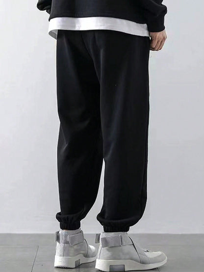 Pantalon de jogging ROMWE Grunge Punk pour homme avec imprimé tête de mort et texte à cordon