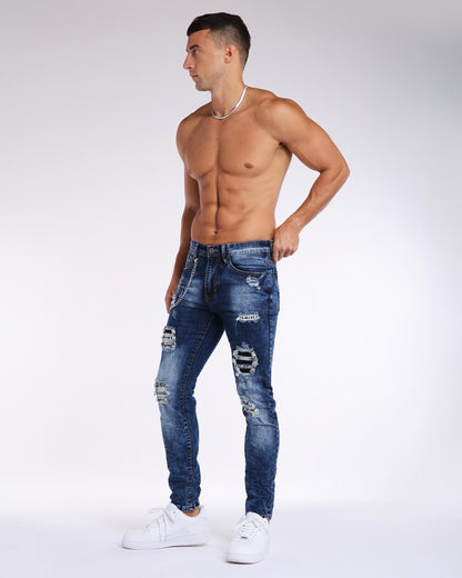 Jean slim bleu délavé avec déchirures