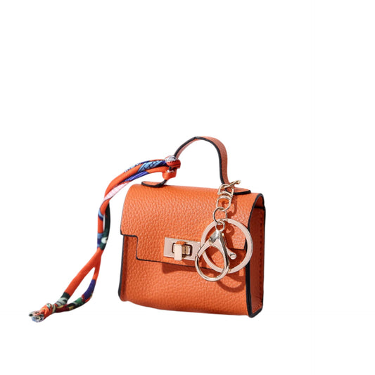 Mini pendentif sac de luxe en plastique