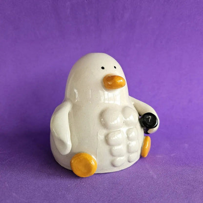 Russell avec des Muscles (Canard de Gym)