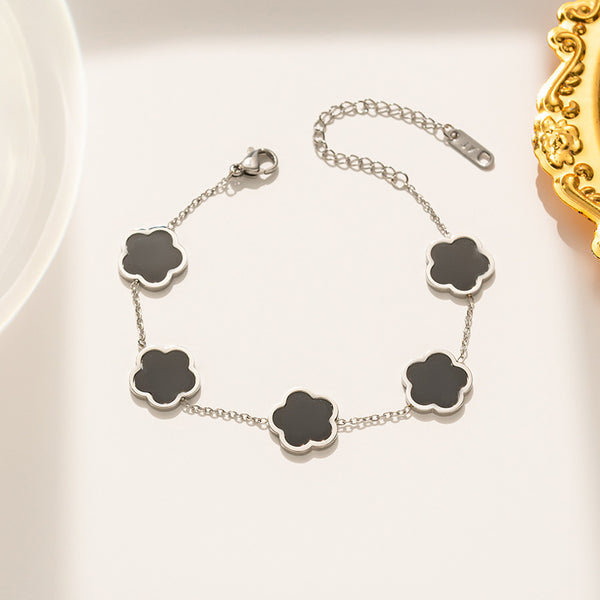 Bracelet en acier titane avec fleur d'herbe Parthenocissus
