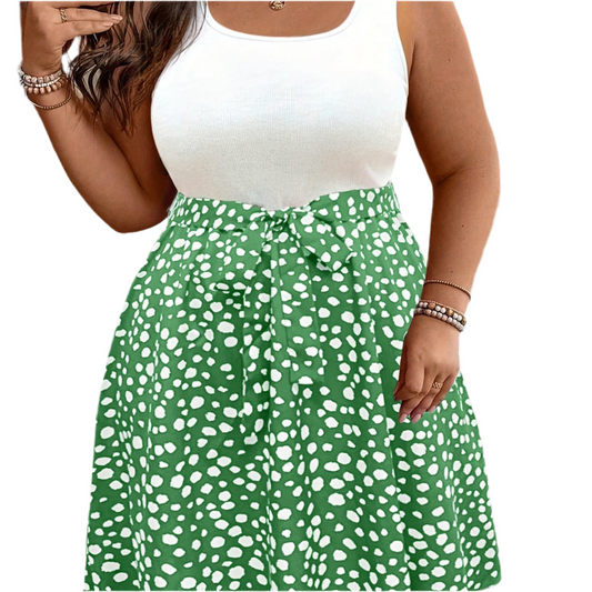 Robe d'été sans manches grande taille bicolore à pois avec détails froncés et ceinture à la taille