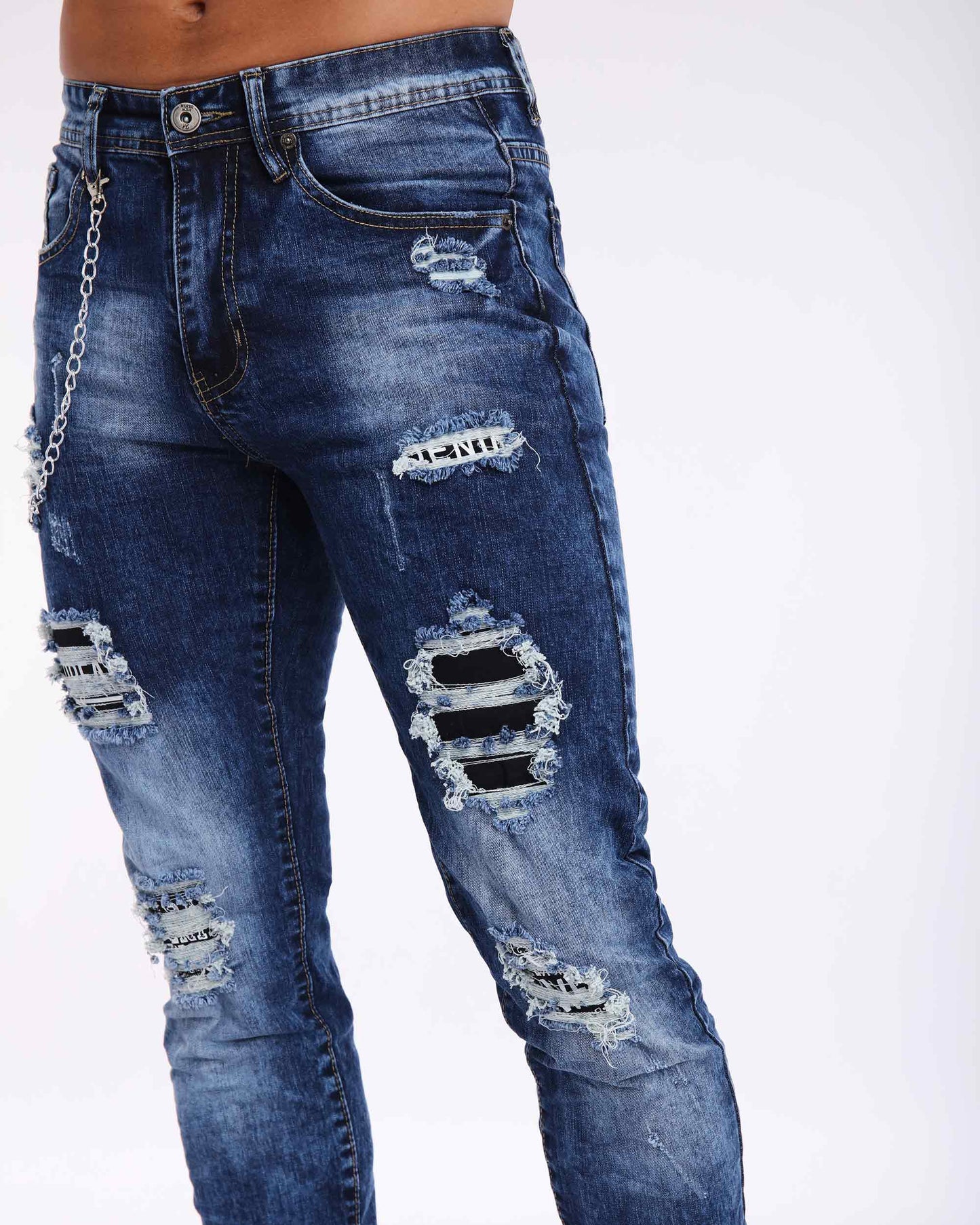 Jean slim bleu délavé avec déchirures