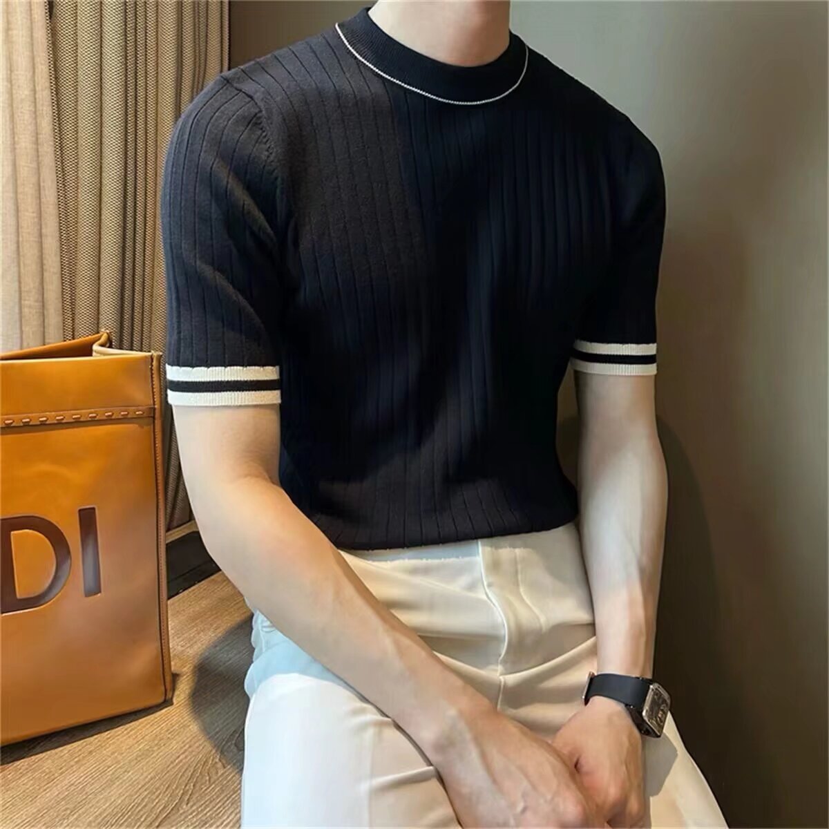 Solid color round neck short sleeved knitted shirt for men