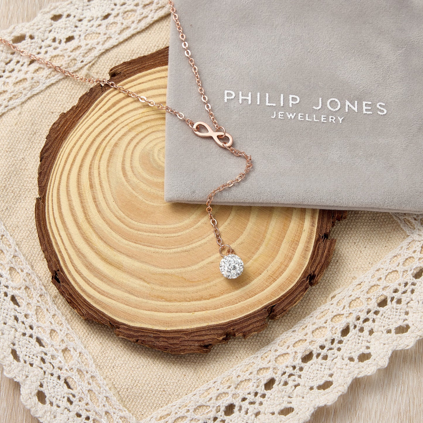 Rose Gold Plated Infinity Lariat Necklace Created with Zircondia® Crystals