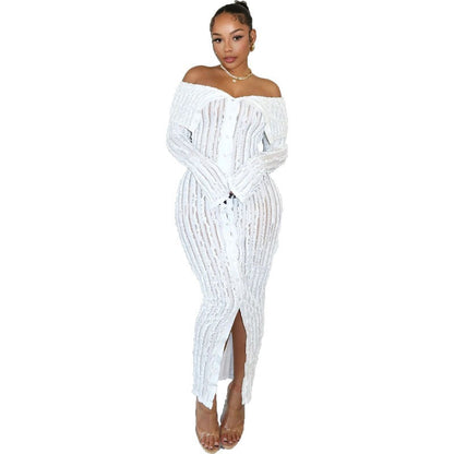 Robe longue à manches longues avec col unique, motif ondulé et jupe fourreau sexy.