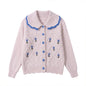 Contrasting diamond patterned sweater