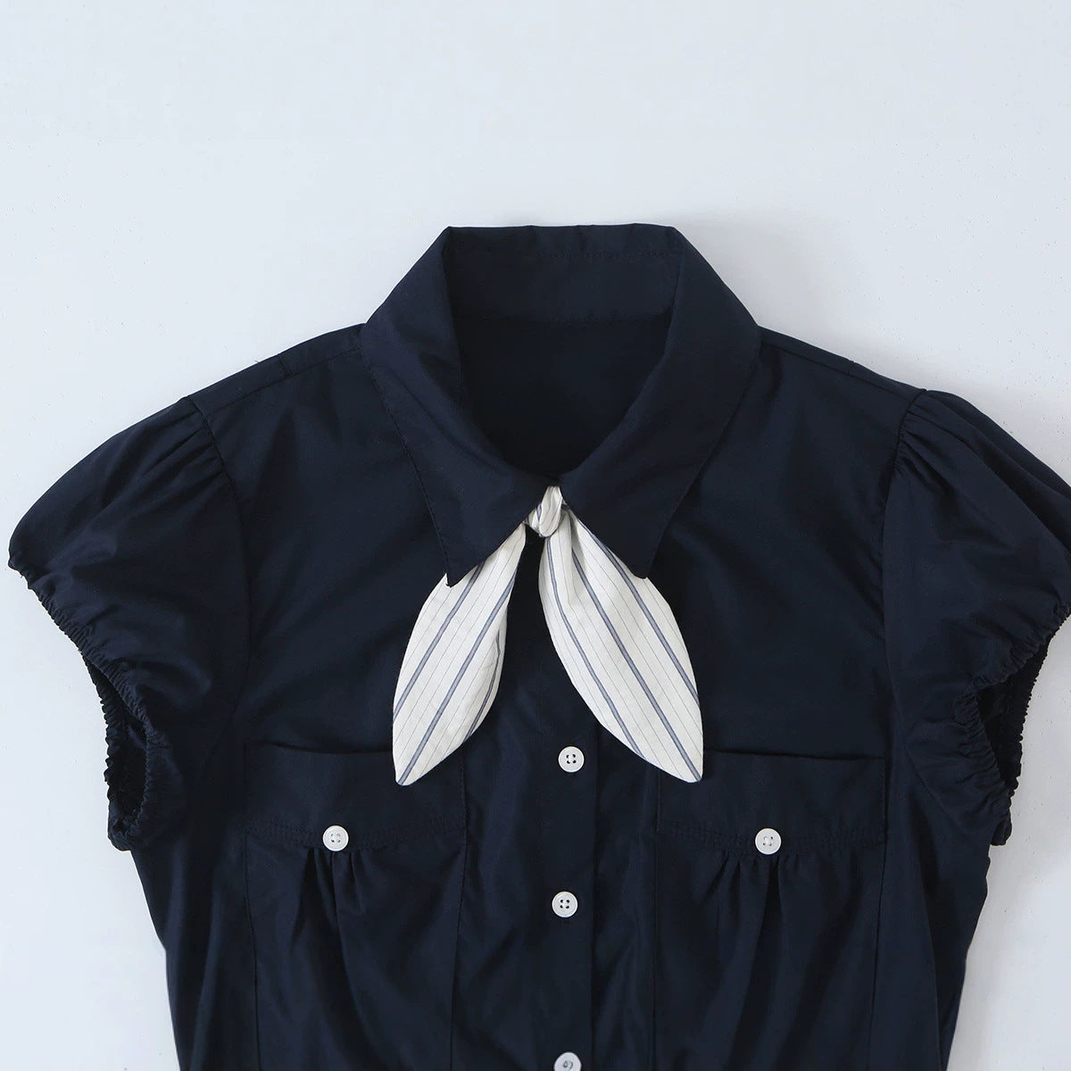 bow tie tied short sleeved shirt