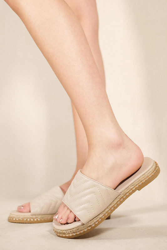 CARMELLA ESPADRILLE FLAT MULES WITH ZIG ZAG STITCH DETAILS IN NUDE FAUX LEATHER