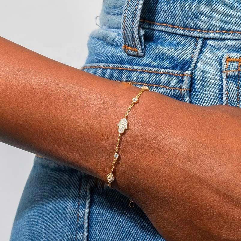 Bracelet Eina main de Fatma et œil protecteur | Plaqué or 18 carats
