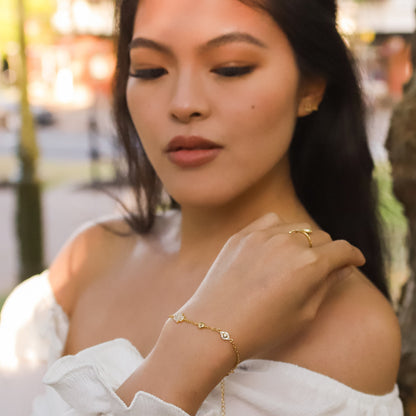 Bracelet Eina main de Fatma et œil protecteur | Plaqué or 18 carats