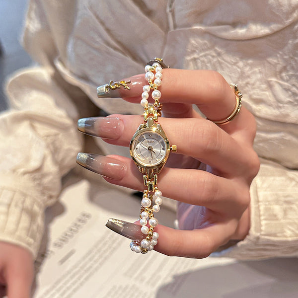 Montre décontractée élégante pour femme avec bracelet en acier