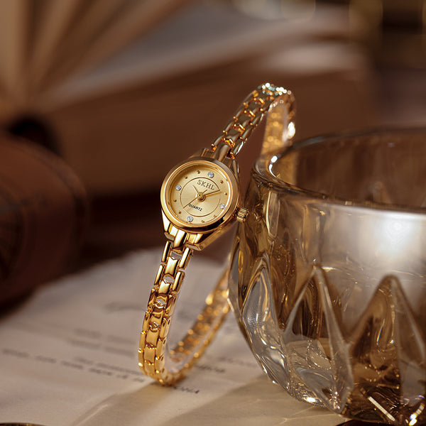 Montre décontractée élégante pour femme avec bracelet en acier