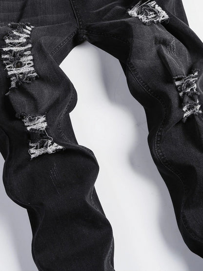 Jeans déchirés délavés taille moyenne