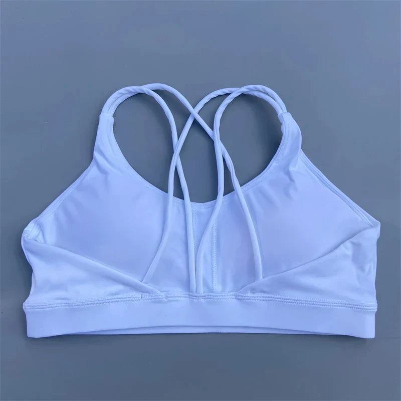 Soutien-gorge de sport uni doux haute résistance pour femme – Haut de sport serré pour entraînement complet, gym, yoga, sous-vêtement serré avec coussinet de poitrine