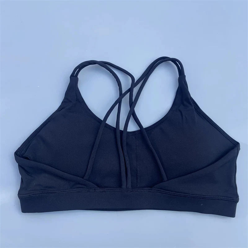 Soutien-gorge de sport uni doux haute résistance pour femme – Haut de sport serré pour entraînement complet, gym, yoga, sous-vêtement serré avec coussinet de poitrine