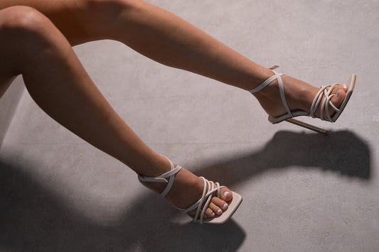 ANNABELLA HIGH HEELS WITH CROSSOVER STRAPS AND ANKLE STRAP DETAIL IN IVORY CREAM FAUX LEATHER