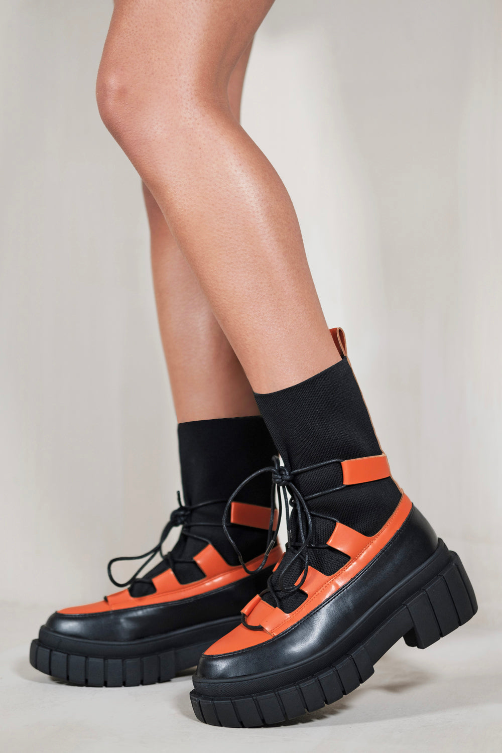 ZURI LACE UP KNITTED CHUNKY SOLE ANKLE BOOTS IN ORANGE