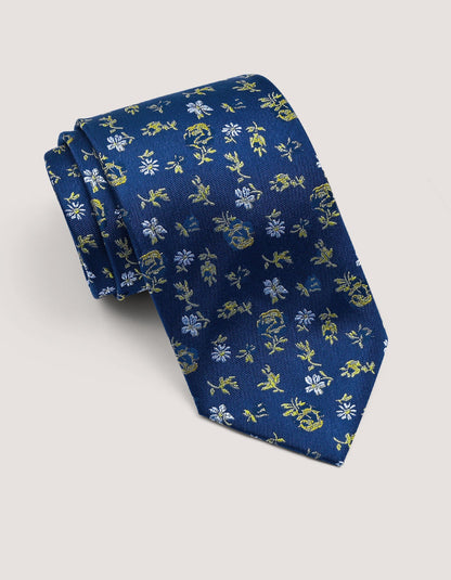 Cravate en soie à motif floral bleu marine et jaune doré