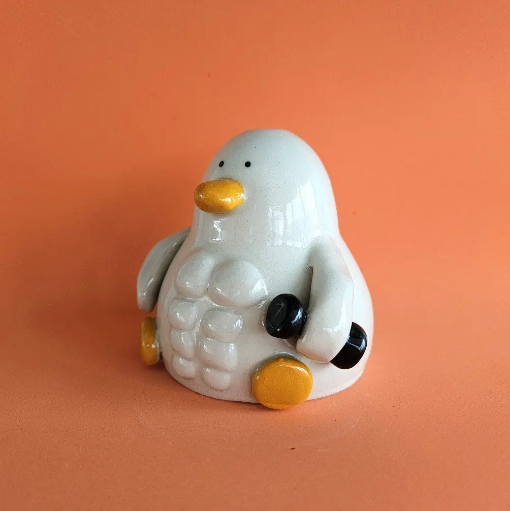 Russell avec des Muscles (Canard de Gym)
