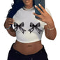 T-shirt décontracté simple à col rond avec nœud en dentelle imprimé à manches courtes