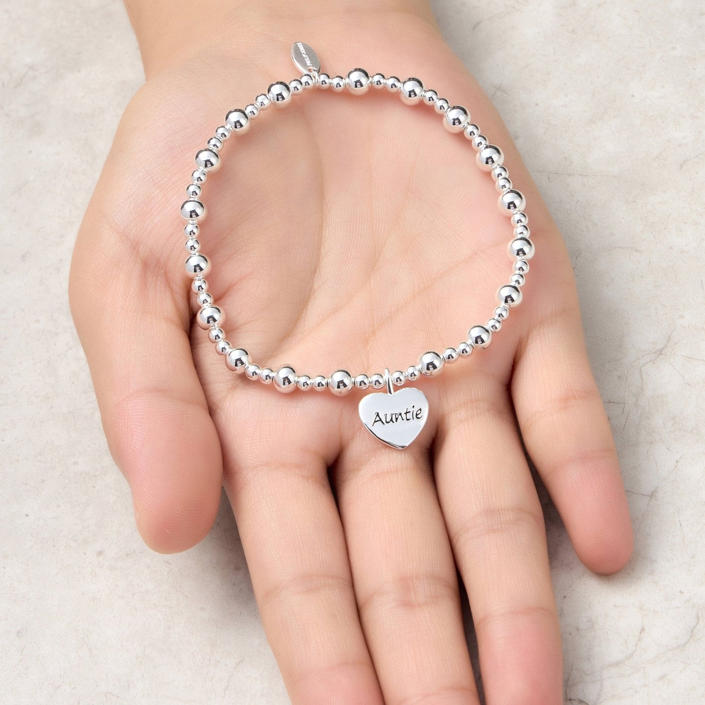 Bracelet extensible perlé breloque Tante Cœur