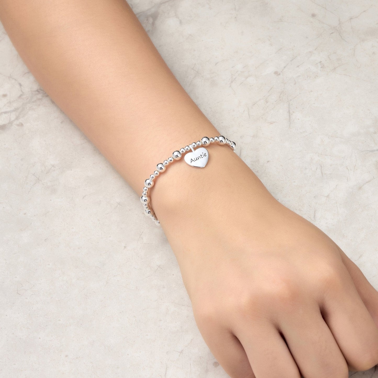 Bracelet extensible perlé breloque Tante Cœur