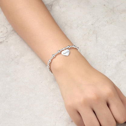 Bracelet extensible perlé breloque Tante Cœur
