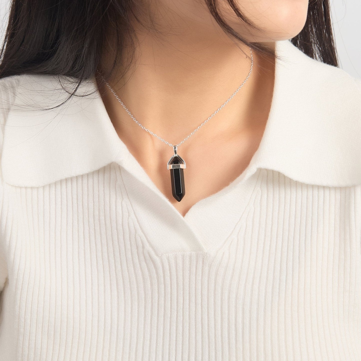 Collier en onyx noir avec carte de citation