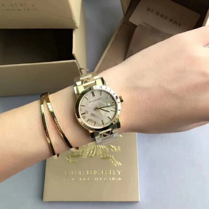 Montre Burberry BU9033 The City unisexe en or