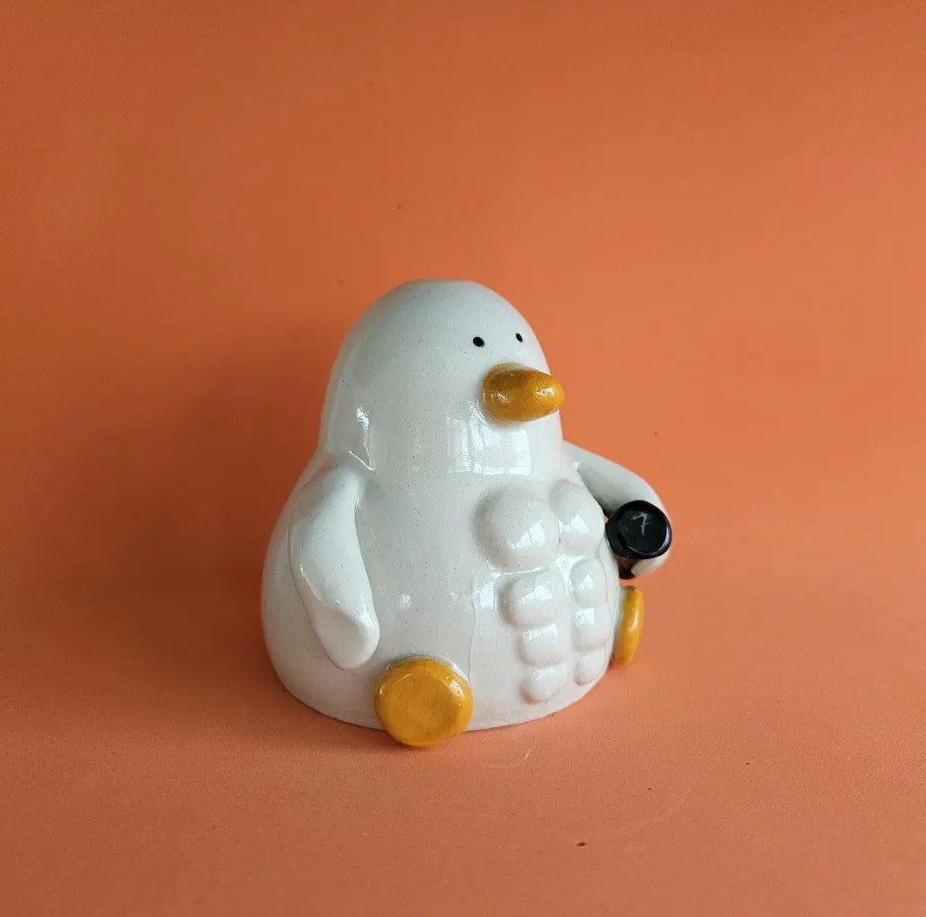 Russell avec des Muscles (Canard de Gym)