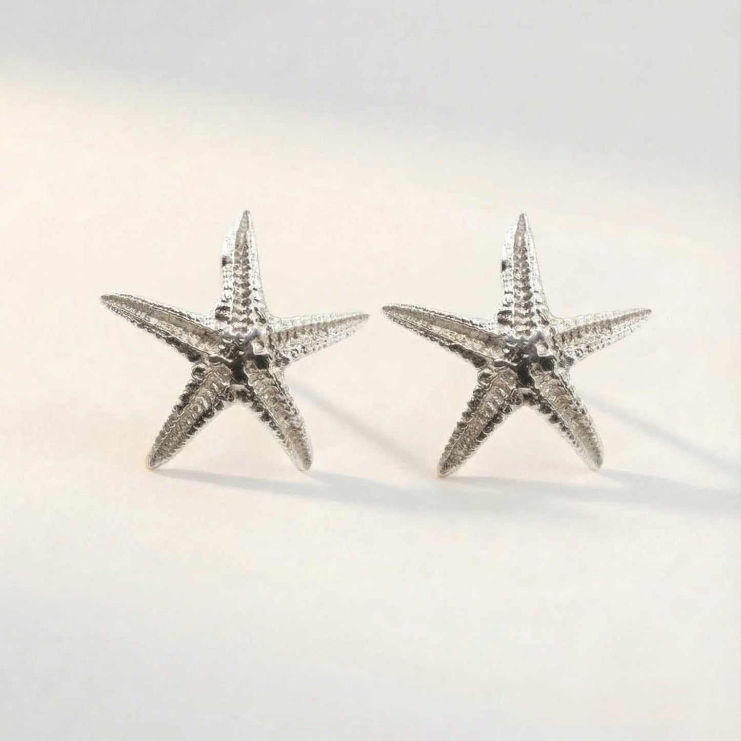 Puces d'oreilles étoile de mer en argent délicates