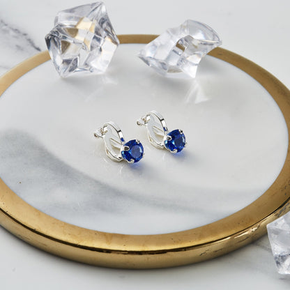 Dark Blue Crystal Clip On Earrings Created with Zircondia® Crystals