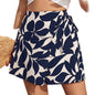 Jupe-short élégante pour femme avec imprimé floral et taille élastique à cordon de serrage.
