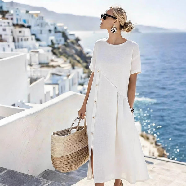 Robe mi-longue à poches plissées et ornements boutonnés