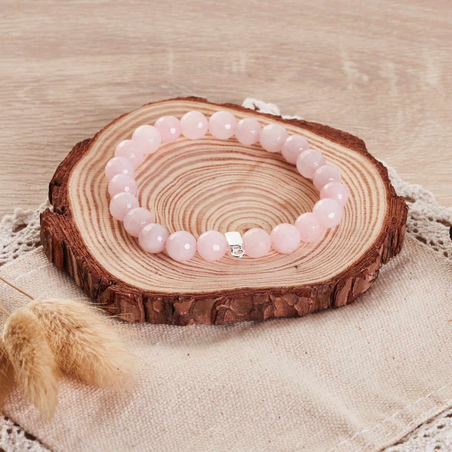 Faceted Rose Quartz Gemstone Stretch Bracelet with Charm Created with Zircondia® Crystals