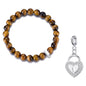 Faceted Tiger's Eye Gemstone Stretch Bracelet with Charm Created with Zircondia® Crystals
