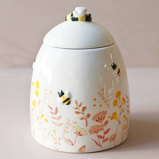 Pot de rangement floral bleu/rose poudré, rehaussé d'une touche de jaune