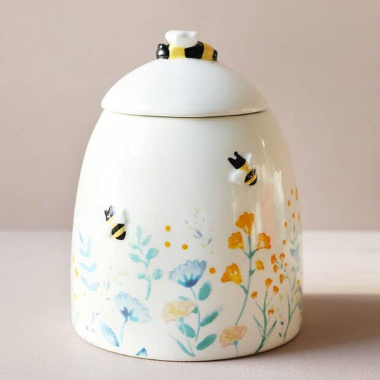 Pot de rangement floral bleu/rose poudré, rehaussé d'une touche de jaune