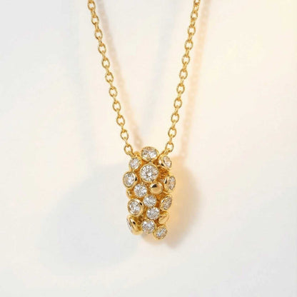 Gold Lyra Necklace with Barnacles and White Topaz