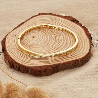 Gold Plated Arc Bangle Created with Zircondia® Crystals (7 Inch)