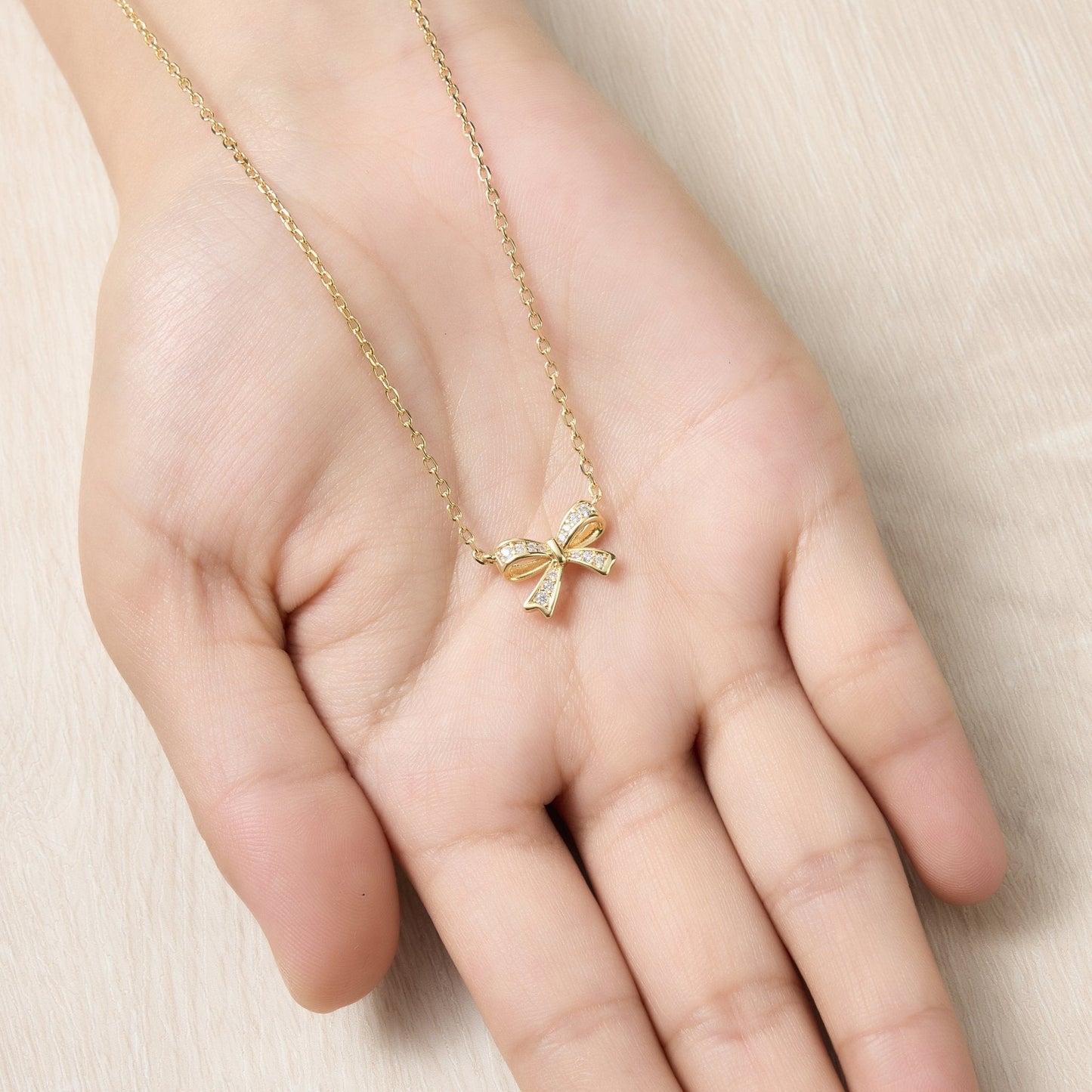 Gold Plated Bow Necklace Created with Zircondia® Crystals
