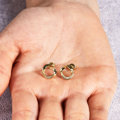 Gold Plated Circle Twist Earrings Created with Zircondia® Crystals