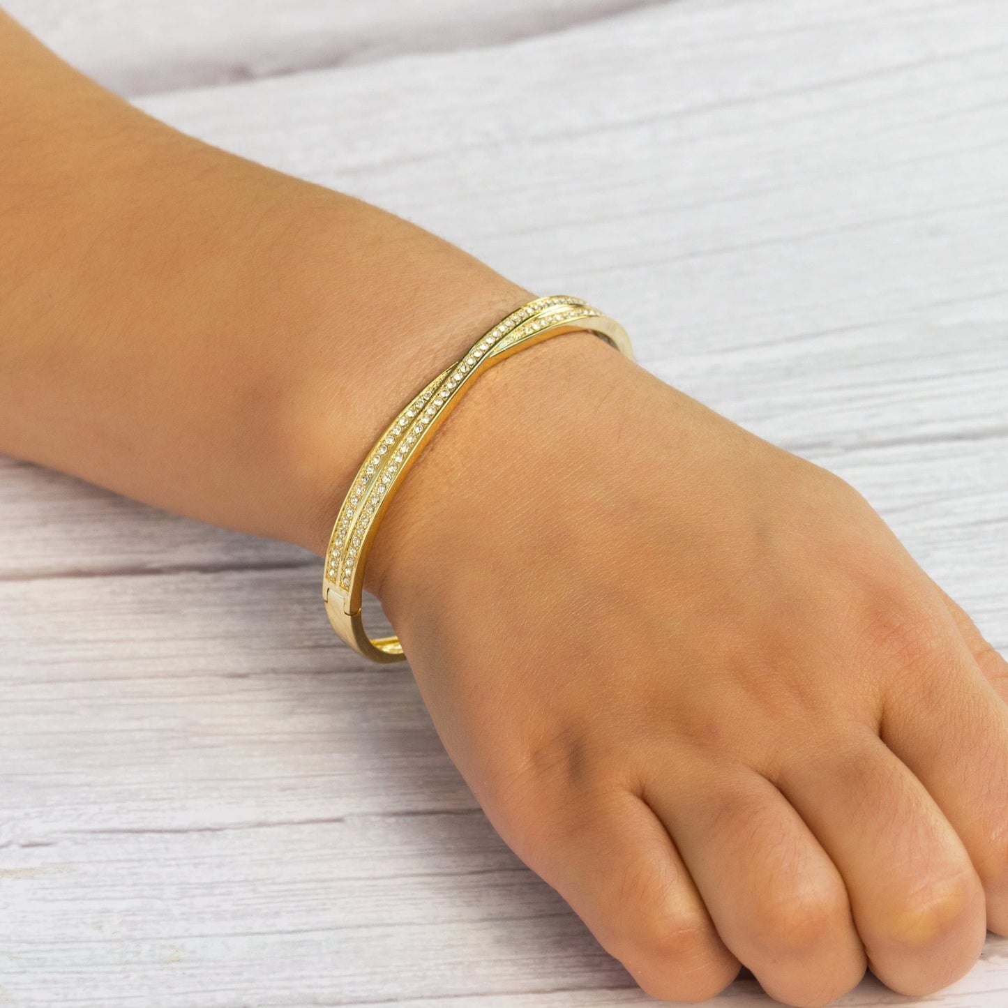 Gold Plated Crossover Bangle Created with Zircondia® Crystals (7 Inch)