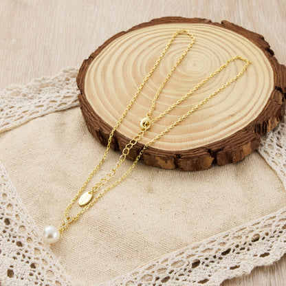 Gold Plated Infinity Pearl Drop Necklace Created with Zircondia® Crystals