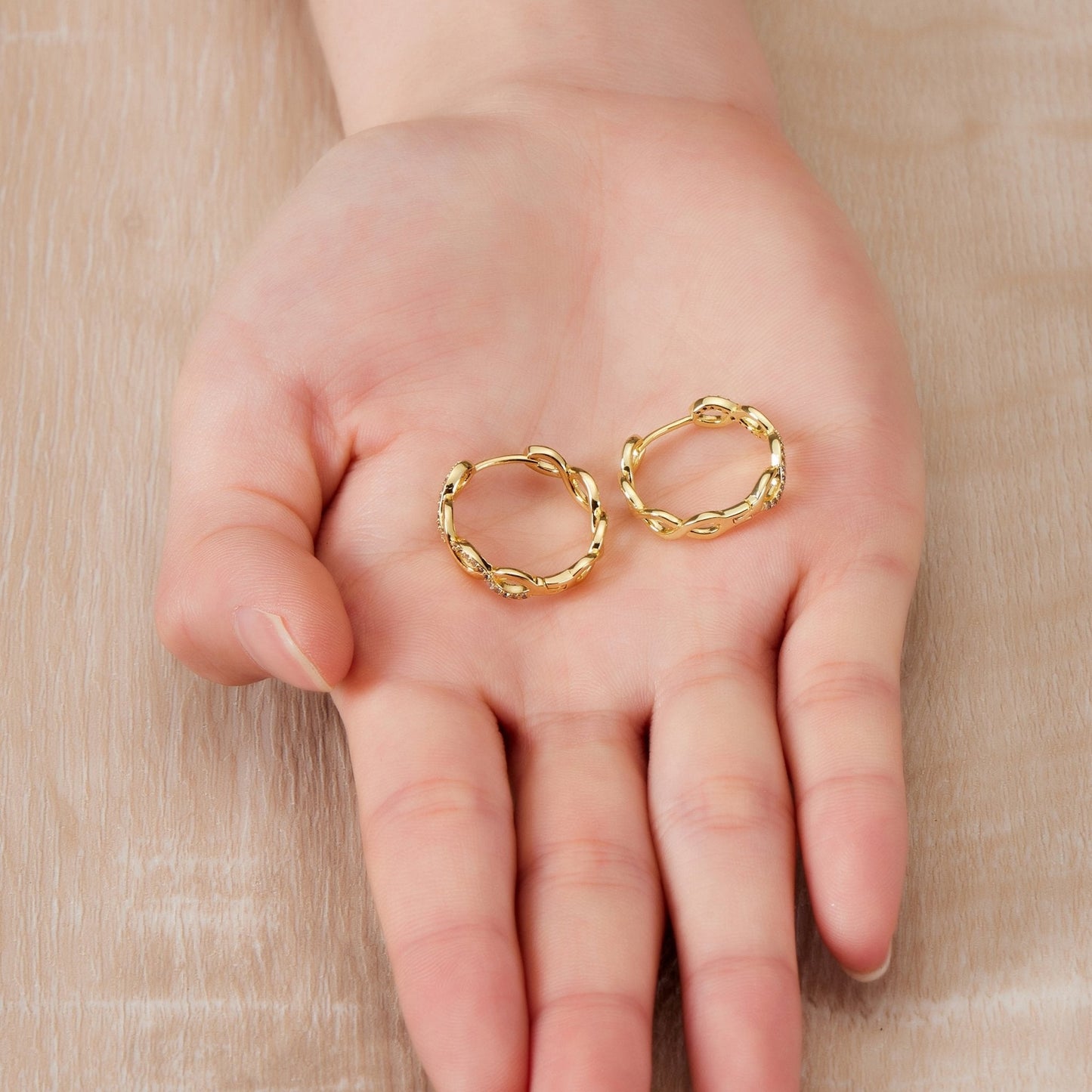 Gold Plated Infinity Hoop Earrings Created with Zircondia® Crystals